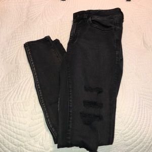 AE black ripped super super stretch jegging